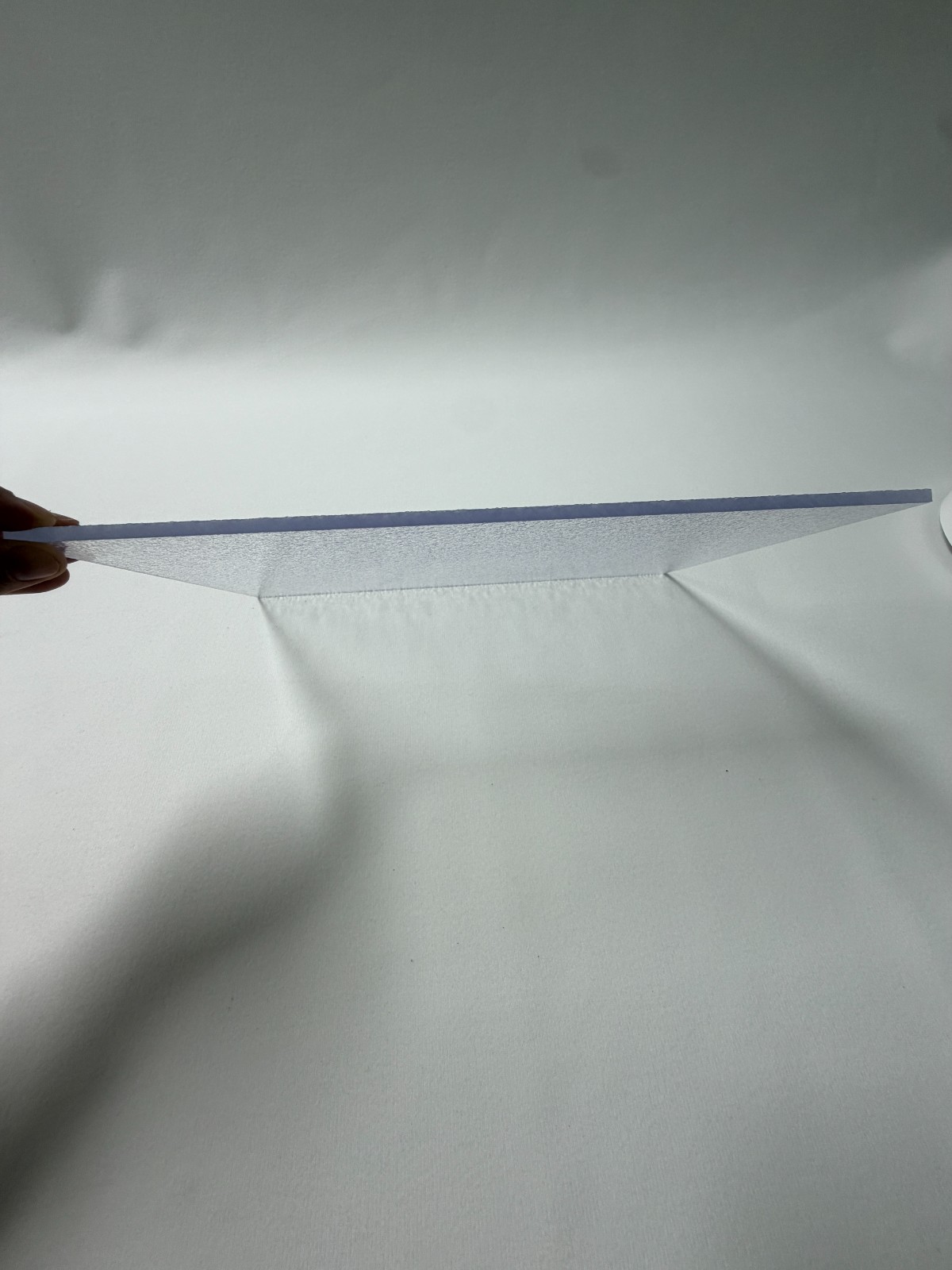 High impact clear solid polycarbonate sheet